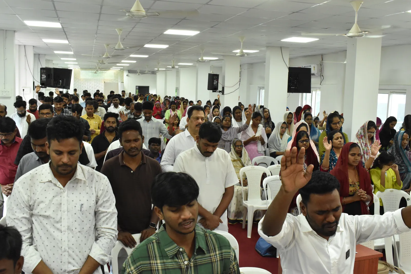 Members praying together